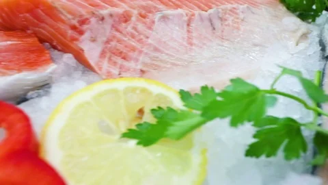 Red salmon fish on the counter of the store in the ice Stock Footage 104121301