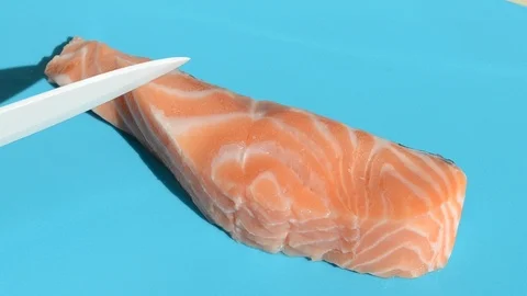 Red salmon fish in the kitchen Stock Footage 125826919