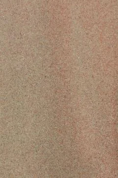 Red sand beach macro background creta island falassarna summer holidays 2020  Stock Photos