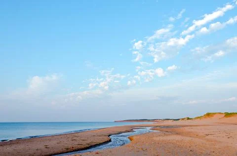 Red sand beach Stock Photos