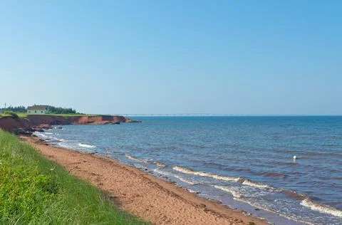 Red sand beach Stock Photos