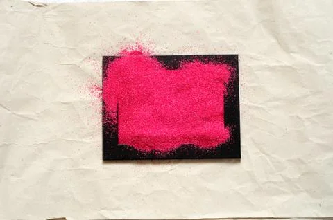 Red sand in a black frame Stock Photos