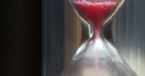 Red sand in hourglass. Time flows backwards. Time works wonders,cures all things Video stock 276569074