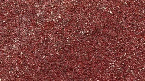 Red Sandpaper Texture loop. Rough Grit Abrasive Background. Used Grain Emer.. Stock Footage 223755710