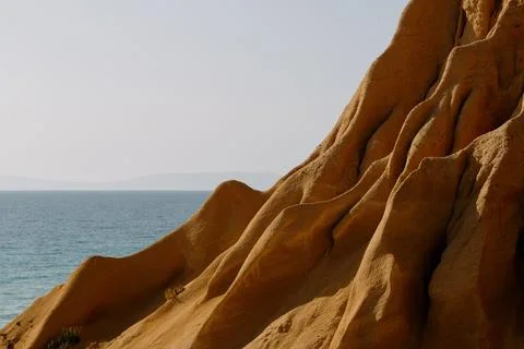 Red Sandstone beach cliffs in Melides, Portugal Stock Photos