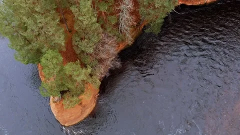 Red sandstone cliffs in the banks of river Salaca, Latvia 스톡 동영상 146069809