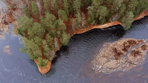 Red sandstone cliffs in the banks of river Salaca, Latvia Stock Footage 146162578