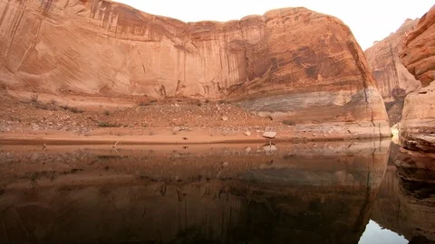 Red Sandstone Cliffs with Calm Water and Reflection Lake Powell Utah Stock Footage 88234985
