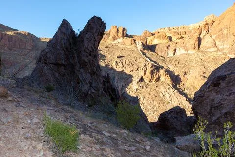 Red sandstone cliffs in the evening at sunset, Organ pipe national park Stock Photos