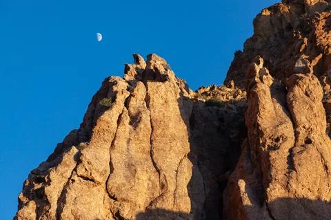 Red sandstone cliffs in the evening at sunset, Organ pipe national park Stock Photos
