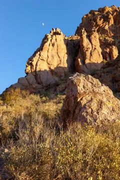 Red sandstone cliffs in the evening at sunset, Organ pipe national park Stock Photos