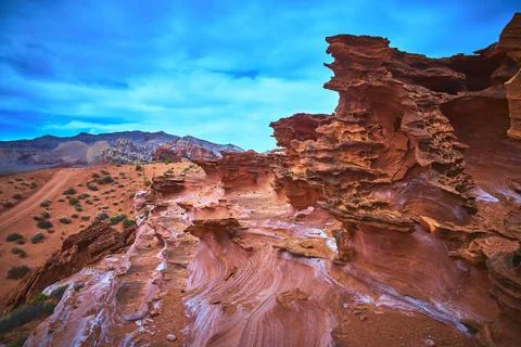 Red Sandstone Formations and Dramatic Sky at Little Finland Nevada Desert L.. Stock Photos