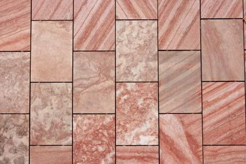 Red sandstone wall background texture. Abstract solid flat stone surface. 스톡 사진