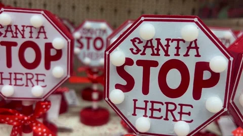 Red Santa Stop Here sign stands out as a Christmas decoration Video stock 289965854