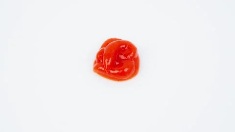Red Sauce Rotating on White Background Isolated Stock Footage 325348999