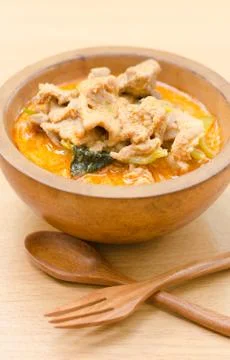 Red savory curry paste with pork and coconut milk (panang) Stock Photos