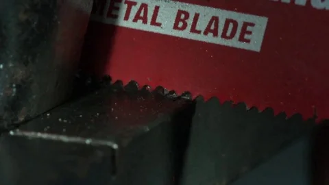 Red Saw Cuts Through Metal Closeup Stock Footage 77783215
