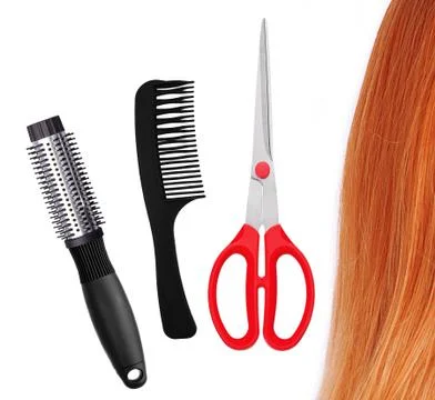 Red scissors, combs and red hair isolated on white Stock Photos
