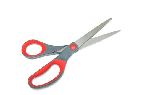 Red scissors isolated on a white background Foto stock