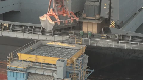 Red scoop dropping cement. Stock Footage 89968230