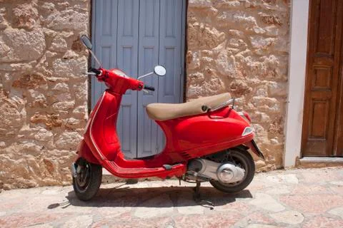 Red scooter Stock Photos