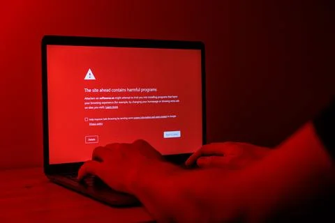 Red screen with malware warning. Visiting fishy websites with viruses Stock Photos