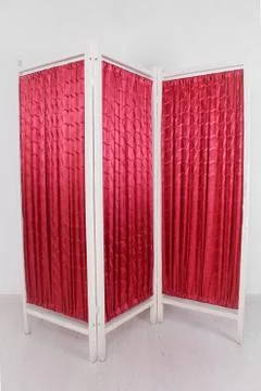 Red screen with a white tree on a white background Stock Photos