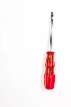 Red screwdriver with flat head on white background Stock Photos