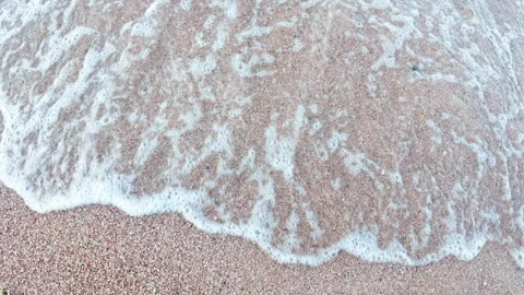 Red Sea Waves Rolling Over Pink Coral Sand, Dahab Egypt Stock Footage 343222859