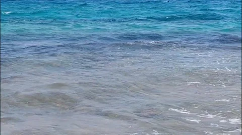 Red Sea waves rolling on shore, clear turquoise ocean water, Hurghada, Egypt Stock Footage 340012006
