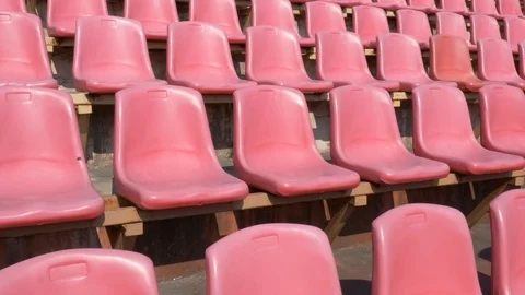 Red seats for spectators in the stadium. Stock Footage 108849656
