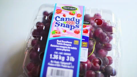 Red seedless grape, candy snaps grapes fresh fruit in plastic container Stock Footage 321986493