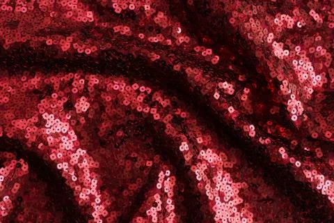 Red sequin texture background. Christmas, festive background Stock Photos