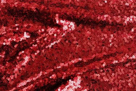 Red sequin texture background. Christmas, festive background Stock Photos