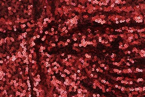 Red sequin texture background. Christmas, festive background Stock Photos