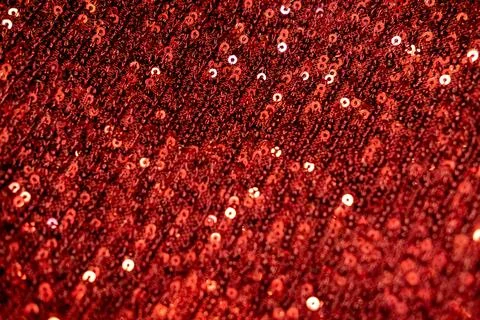 Red sequins background or texture. Sparkling sequined textile Foto stock
