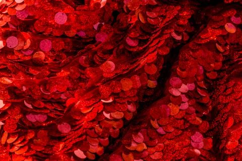 Red sequins pattern. Sparkling sequins background. Red sequin fabric for back Foto stock