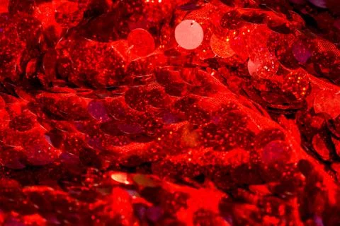 Red sequins pattern. Sparkling sequins background. Red sequin fabric for back Foto stock