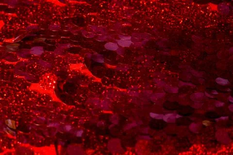 Red sequins pattern. Sparkling sequins background. Red sequin fabric for back Foto stock