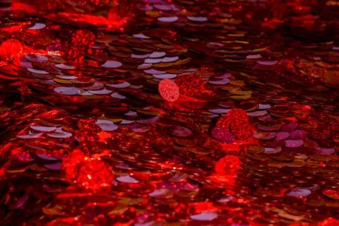 Red sequins pattern. Sparkling sequins background. Red sequin fabric for back Foto stock