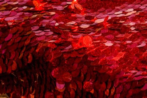 Red sequins pattern. Sparkling sequins background. Red sequin fabric for back Foto stock