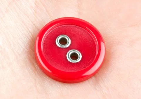 Red sewing button Stock Photos
