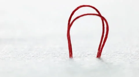 Red sewing thread Stock Footage 47903433