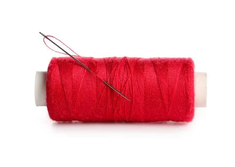 Red sewing thread with needle on white background Stock Photos