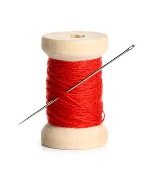 Red sewing thread with needle on white background Stock Photos