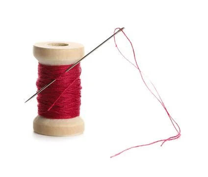Red sewing thread with needle on white background Stock Photos
