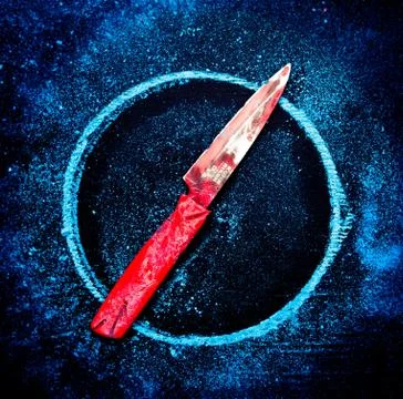 Red sharp Knife on blue chalk circle shape Stock Photos