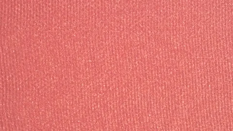 Red shimmer cosmetics background. Pink blusher texture, macro, top view. De.. Stock Footage 254246786