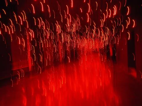 Red shining background lights with motion blur Stock Photos