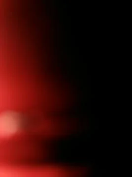 Red shiny background with different elements in a blur effect Foto stock